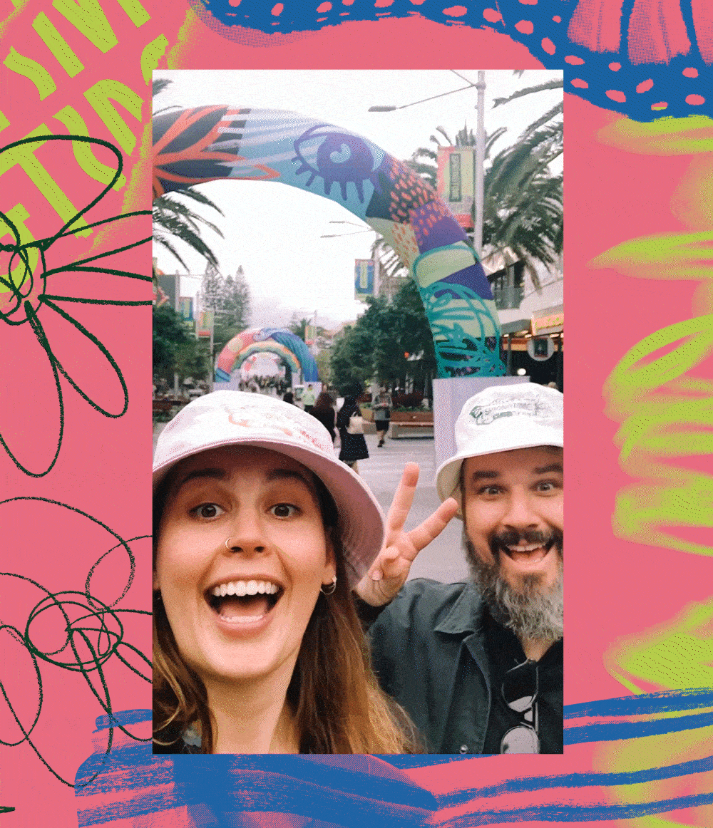 Woman and Man selfie photo infront of lagescale art installations for SpringTime Festival Gold Coast 2-4 September 2022