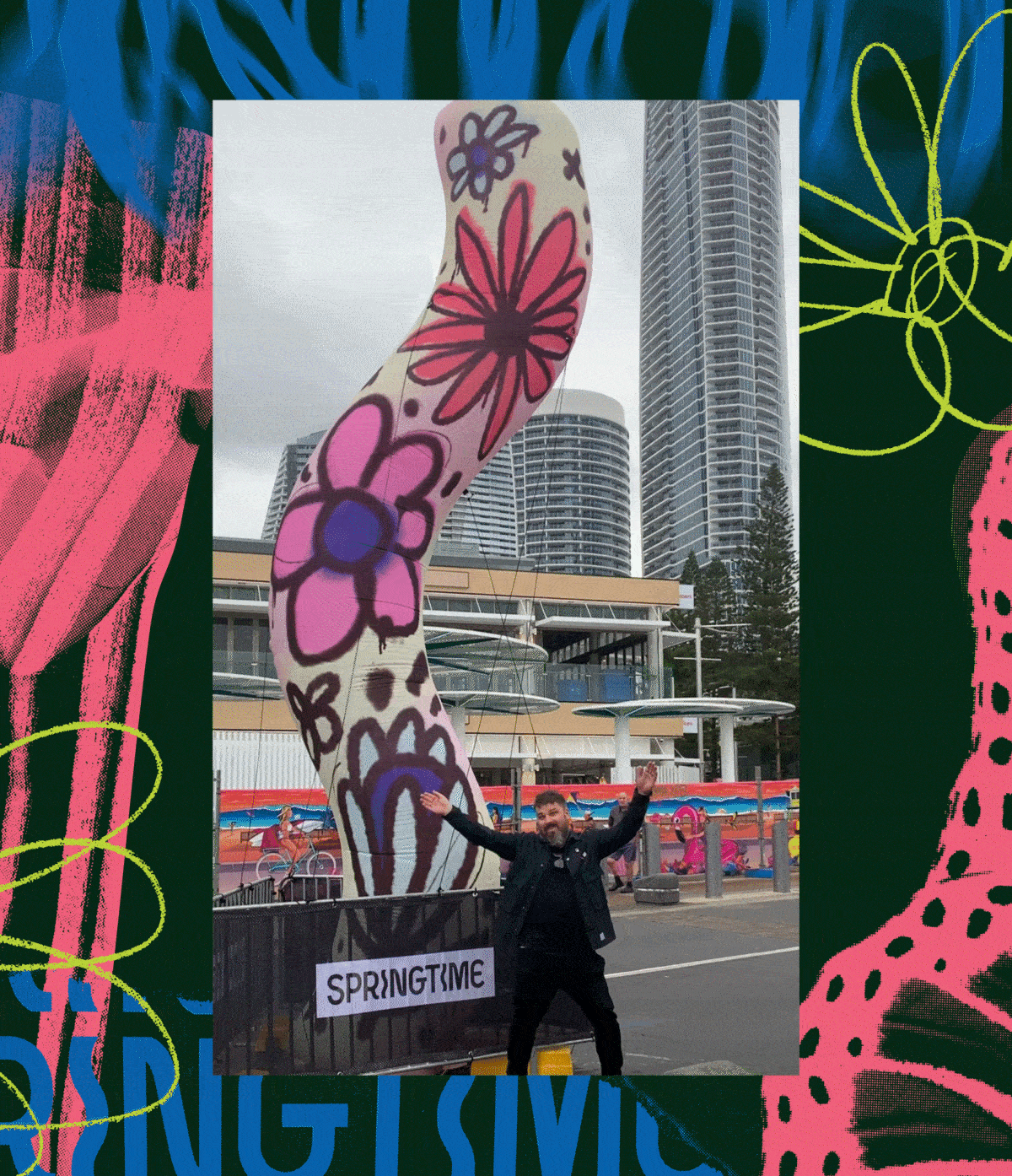 Image of man infront of springtime mural